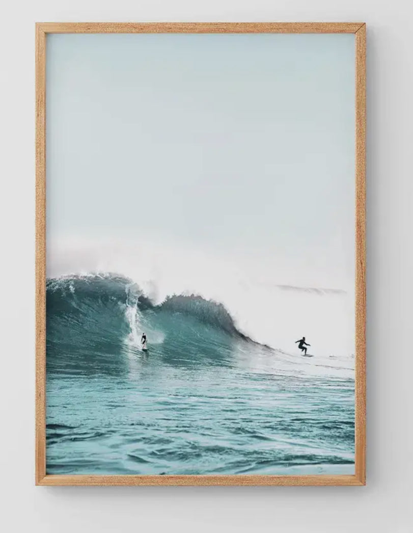 Surfers on Blue Wave